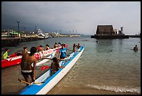 Kamakahonu Beach with outrigger canoeists, Kailua-Kona. Hawaii, USA (color)