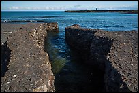 Walled stream flowing into Kiholo Bay. Big Island, Hawaii, USA (color)