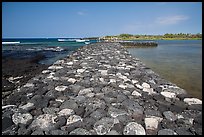 Rock wall separating Kaloko fishpond from the ocean, Kaloko-Honokohau National Historical Park. Hawaii, USA ( color)