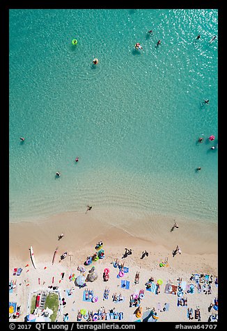 Aerial view of ocean water and beach shore looking down, Kuhio Beach. Waikiki, Honolulu, Oahu island, Hawaii, USA (color)