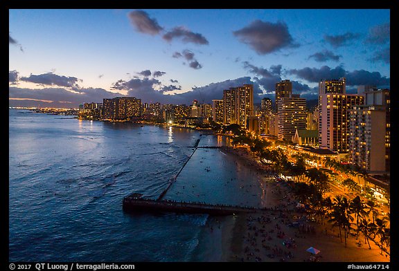 Aerial view of Kuhio Beach, skyline at dusk. Honolulu, Oahu island, Hawaii, USA (color)