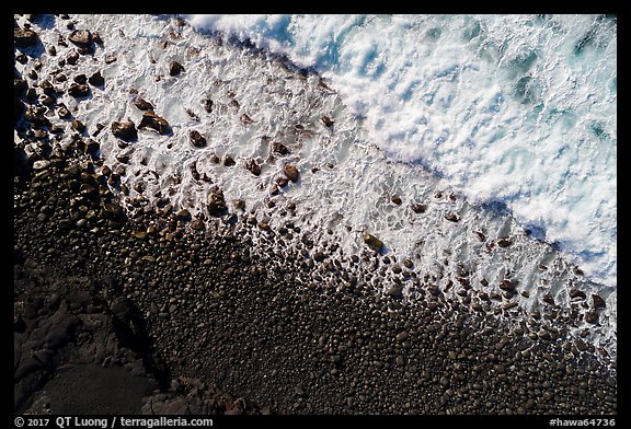 Aerial view of surf and lava rocks looking down, Kaimu Beach. Big Island, Hawaii, USA (color)