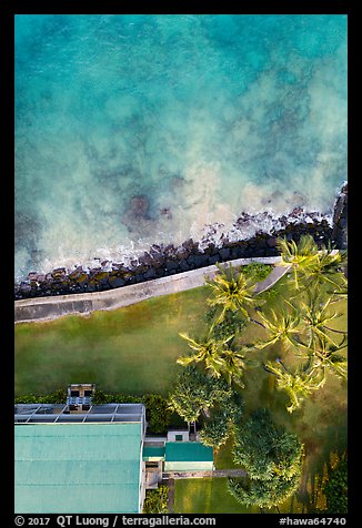 Aerial view of Hulihee Palace, palm trees, and coast looking down. Hawaii, USA (color)