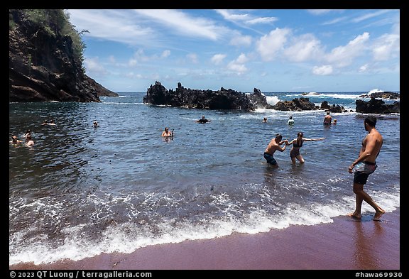 Beach-goers at Red Sand Beach, Hana. Maui, Hawaii, USA (color)