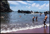 Beach-goers at Red Sand Beach, Hana. Maui, Hawaii, USA ( color)