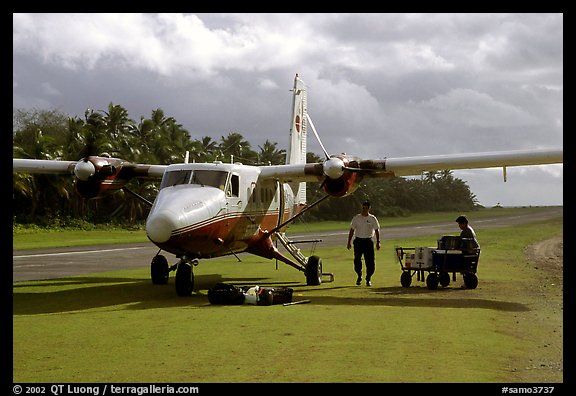 Plane on the airstrip of Ofu Island in 2002. American Samoa (color)