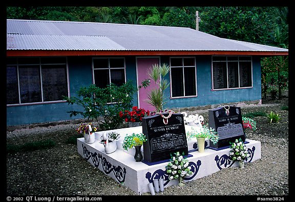 Tombs in front of a home in Faleasao. American Samoa