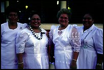 Sunday women churchgoers dressed in white, Pago Pago. Pago Pago, Tutuila, American Samoa ( color)