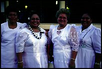 Sunday women churchgoers dressed in white, Pago Pago. Pago Pago, Tutuila, American Samoa (color)