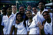 Group of Sunday churchgoers, all white-clad, Pago Pago. Pago Pago, Tutuila, American Samoa