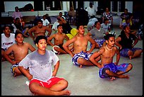 Villagers getting ready for traditional dance, Aua. Tutuila, American Samoa (color)