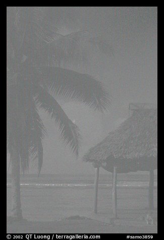 Beach fale with dog near Amouli. Tutuila, American Samoa (color)