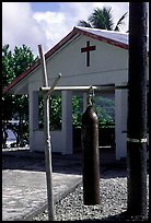 Gong and church, Aunuu village. Aunuu Island, American Samoa (color)