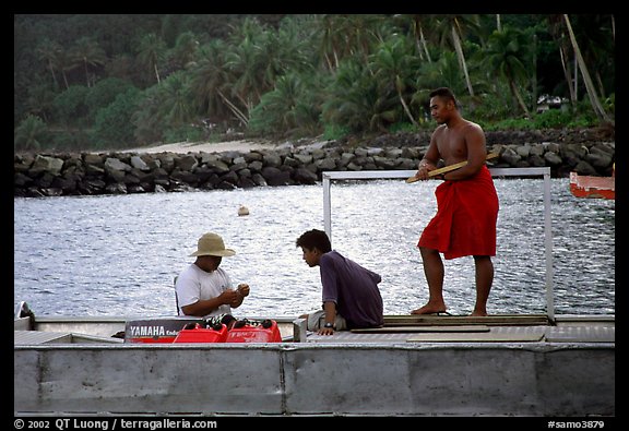 Men on a ferry to Aunuu. Aunuu Island, American Samoa (color)