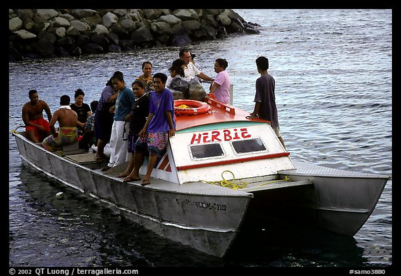 Villagers crowd a ferry to Aunuu. Aunuu Island, American Samoa