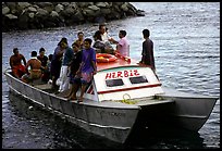 Villagers crowd a ferry to Aunuu. Aunuu Island, American Samoa