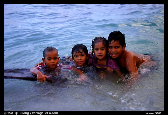 Children in the water. Tutuila, American Samoa