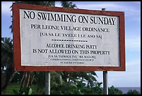 Sign prohibiting activities on Sunday. Tutuila, American Samoa (color)