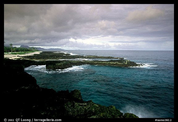 Balsalt rocks on the Vaitogi coast, site of the Shark and Turtle legend. Tutuila, American Samoa