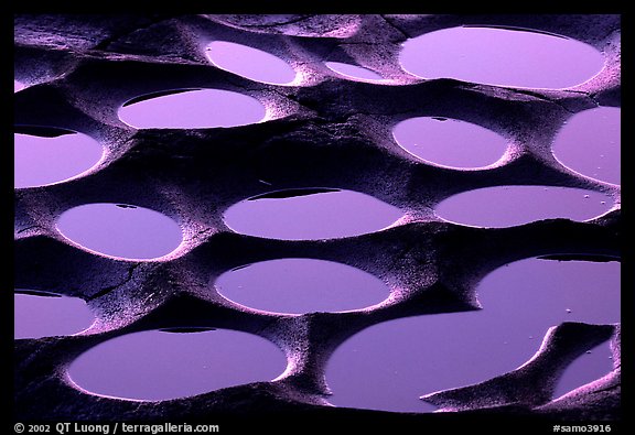 Ancient grinding stones (foaga) near Leone at sunset. Tutuila, American Samoa (color)