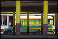 Bus and fale in Masefau village. Tutuila, American Samoa ( color)
