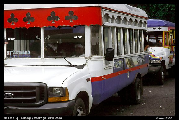 Colorful aiga busses, Pago Pago. Pago Pago, Tutuila, American Samoa (color)