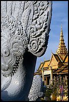 Statue and pagoda, Royal palace. Phnom Penh, Cambodia