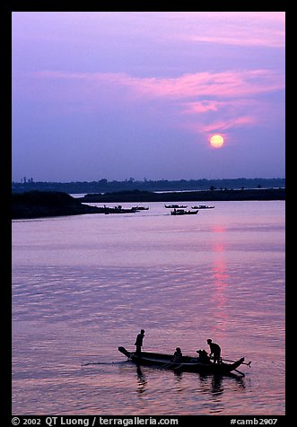 Boat and sunrise, Tonle Sap,  Phnom Phen. Cambodia