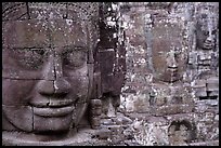 Serene and massive stone faces, the Bayon. Angkor, Cambodia