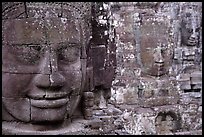 Serene and massive stone faces, the Bayon. Angkor, Cambodia (color)