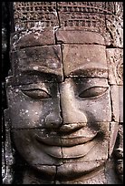 Enigmatic stone smiling face, the Bayon. Angkor, Cambodia (color)