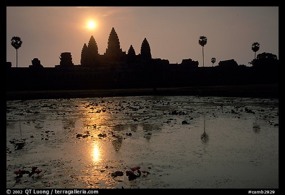 Angkor Wat reflected in pond at sunrise. Angkor, Cambodia (color)