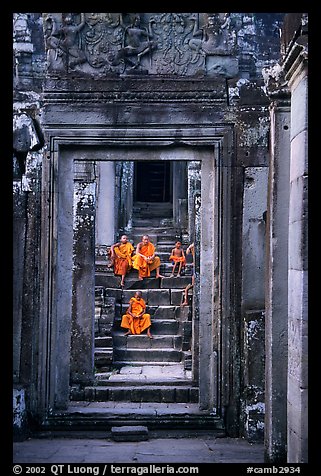 Buddhist monks in the Bayon. Angkor, Cambodia (color)