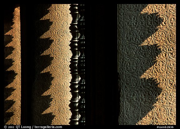 Shadow patterns of circular columns projected on wall, Angkor Wat. Angkor, Cambodia (color)