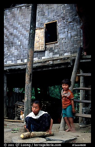 Children near stilt house of a small hamlet. Mekong river, Laos (color)