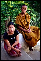 Buddhist novice monk and his sister. Luang Prabang, Laos