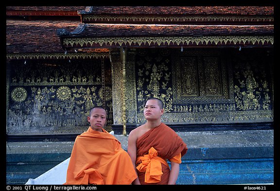 Two buddhist novice monks at Wat Xieng Thong. Luang Prabang, Laos (color)