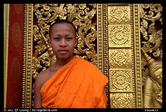 Buddhist novice monk at Wat Xieng Thong. Luang Prabang, Laos (color)