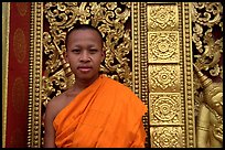 Buddhist novice monk at Wat Xieng Thong. Luang Prabang, Laos (color)