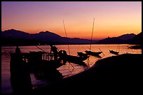 Boats, sunset on the Mekong river. Luang Prabang, Laos