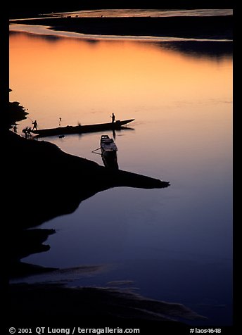 Boats, sunset on the Mekong river, Luang Prabang. Mekong river, Laos (color)