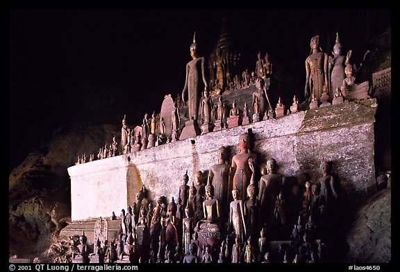 Buddha statues left by pilgrims in Pak Ou caves. Laos