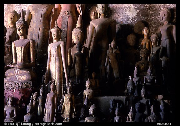 Lao style Buddha sculptures assembled over the centuries by local people, Pak Ou. Laos (color)