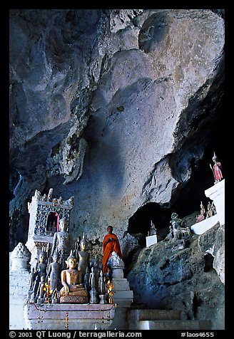 Novice Buddhist monk in  Tham Ting cave,  Pak Ou. Laos