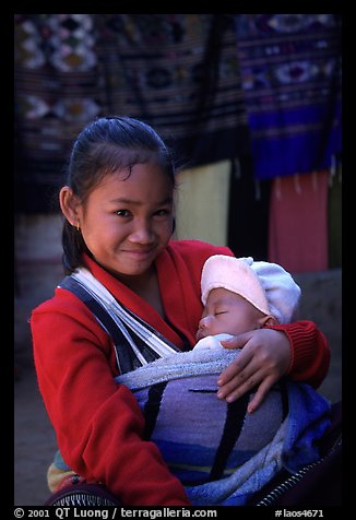 Girl and baby, Ban Xang Hai. Laos (color)