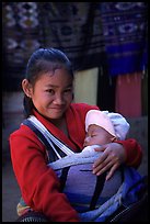 Girl and baby, Ban Xang Hai. Laos