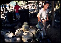 Making of the Lao Lao, strong local liquor in Ban Xang Hai village. Laos ( color)