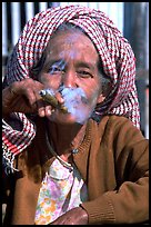 Woman smoking a cheerot,  Kalaw. Shan state, Myanmar ( color)