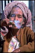 Woman smoking a cheerot,  Kalaw. Shan state, Myanmar ( color)