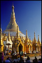 Praying at Planetery post, the Shwedagon Paya. Yangon, Myanmar (color)